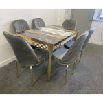grey sand table with star chairs
